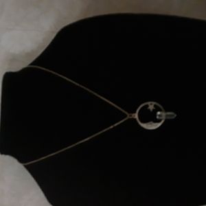 Silver moon and star and crystal necklace